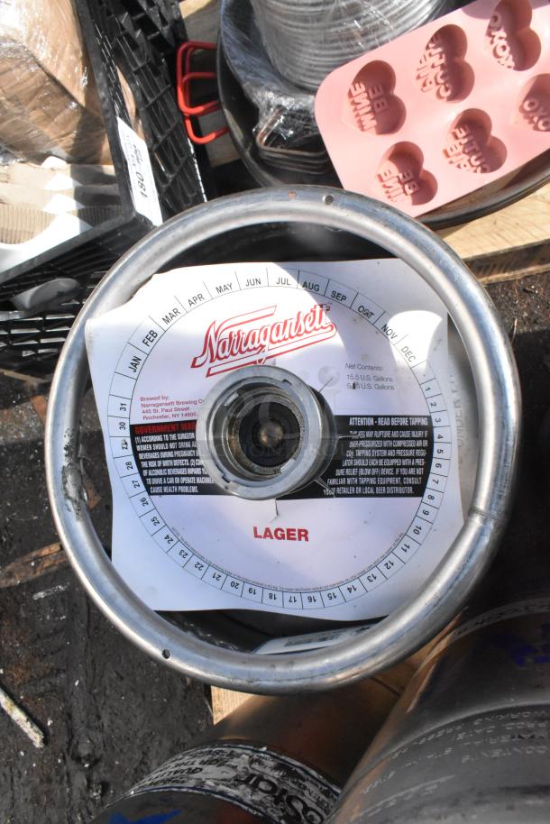 Narragansett beer keg, metal, 15.5 gallons, "Lager" label. Includes brew details and warning instructions. Auction for 12 kegs.