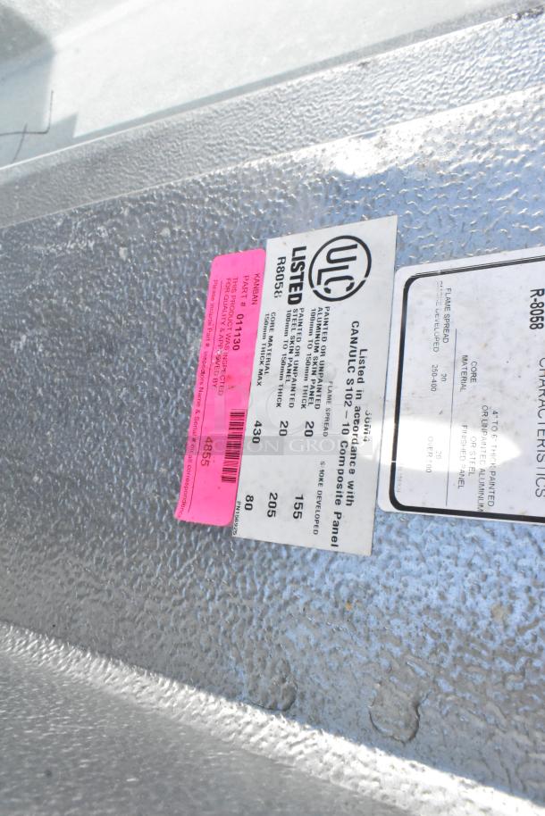 ULC listed Walk In Box panel with label, model R8055. Core: aluminum, 3-inch thick. Tags show compliance and specs.