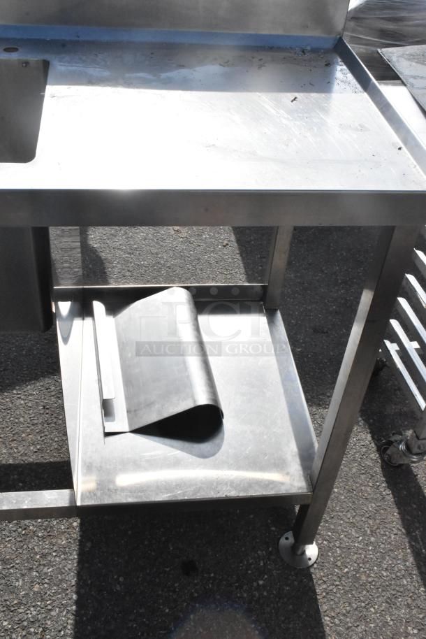 Commercial single bay sink in stainless steel, featuring a spacious basin. Moderate wear visible on surface.