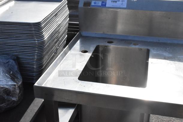 Commercial single bay stainless steel sink with backsplash. Durable, suitable for professional kitchens. Good condition.