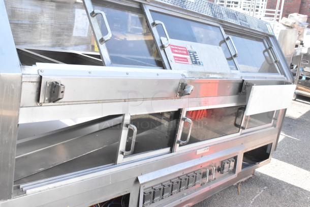 Custom Deli's DILN8CRSS heated display case merchandiser, stainless steel, glass doors, 120/208 volts, 1 phase, commercial use.