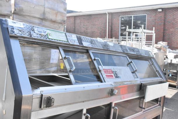 Custom Deli's DILN8CRSS heated display case, stainless steel, 120/208V, 1 phase, tempered glass doors, operational labels.