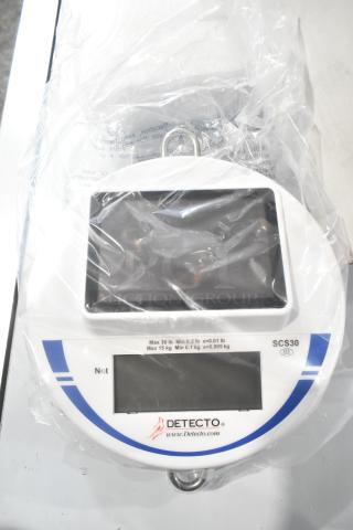 Detecto SCS30 Digital Solar Hanging Scale, new condition, with dual LCD displays, maximum capacity of 30 lb/15 kg.