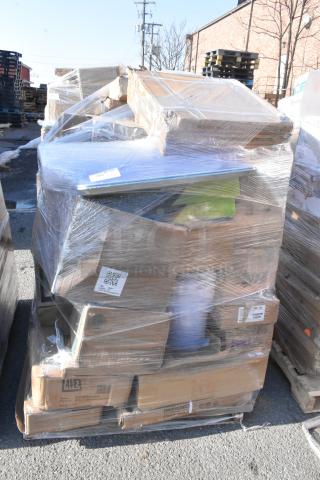 Pallet wrapped with assorted items including bussing cart, containers, carpet, and binders. Labels suggest scratch and dent condition.