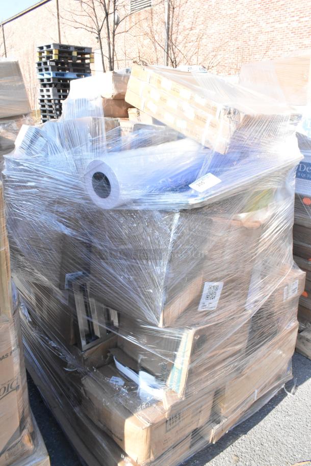 Pallet of brand new scratch and dent items, including bussing cart, containers, and carpet, wrapped in plastic.