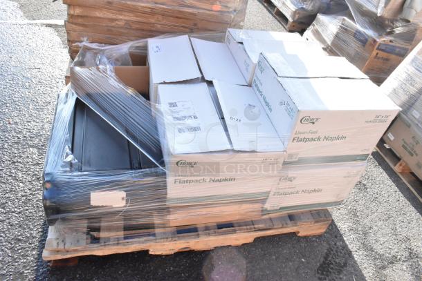 Nine new scratch and dent items, including a CO2 tank and beverage dispenser, packed on a pallet with wrapped boxes labeled "Choice Flatpack Napkin."