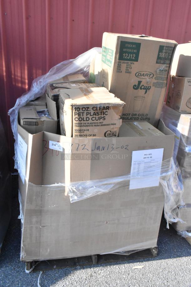 Box of brand new scratch and dent items on a pallet, including Dart cups. Labeled JAN13-02 for auction.