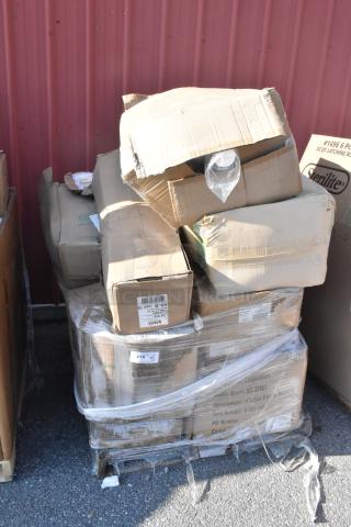 Pallet of boxed scratch and dent items, including bandage wrap and hot cups. Boxes show wear but contents are brand new.