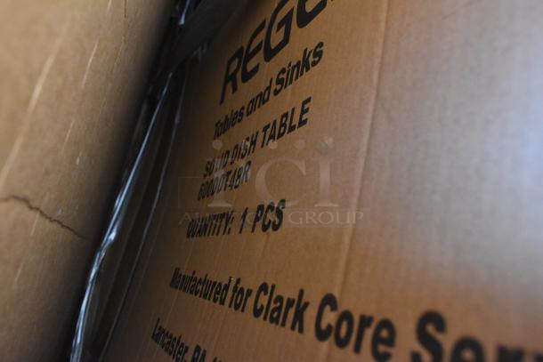 Cardboard box showing "REGO Tables and Sinks, Solid Dish Table, 600DDT48R, Quantity: 1 PCS." New condition, scratch and dent.