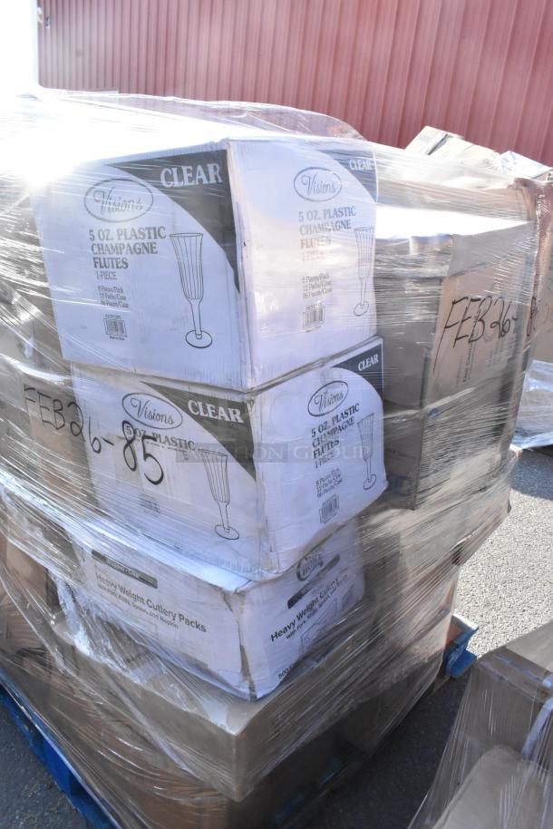 Pallet of 28 brand new scratch and dent items including Visions plastic champagne flutes and cutlery packs, marked FEB26-85.