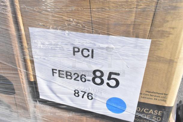 Palette of scratch and dent items including plates, cups, lids, and bags. Labeled "PCI FEB26-85" for auction identification.