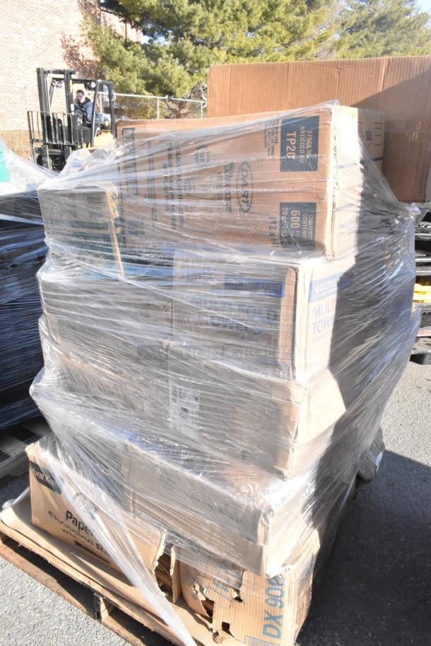 Shrink-wrapped pallet of 26 new scratch and dent items, including boxes labeled "multi-fold towels," on a wooden pallet.