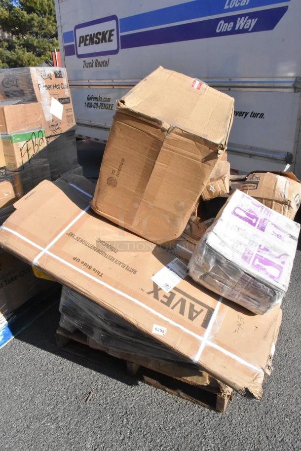 Assorted scratch and dent items on a pallet, including a partition, ingredient bin, and mop bucket. Boxes show some wear.