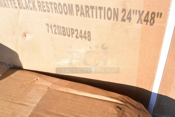 Cardboard box marked "Matte Black Restroom Partition 24"x48"", SKU 712MBUP2448, showing visible wear.