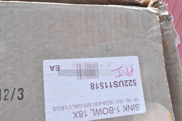 Cardboard box with label for a sink bowl, marked "522US15118" and "I2D." Box is scratched and dented.