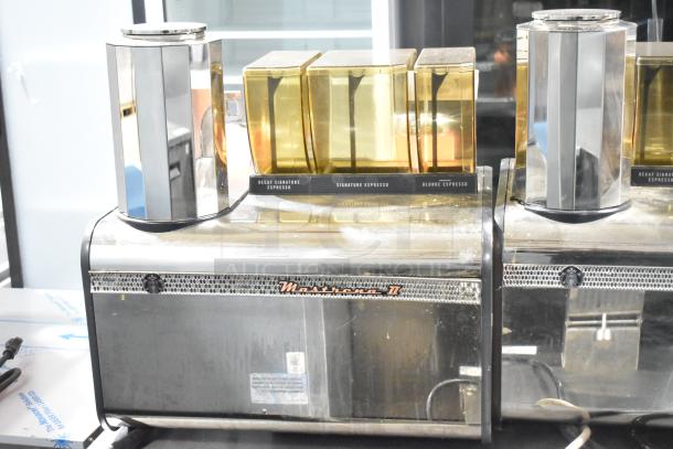 Thermoplan Mastrena commercial espresso machine, stainless steel, 250 volts, with coffee bean hoppers. Good condition.