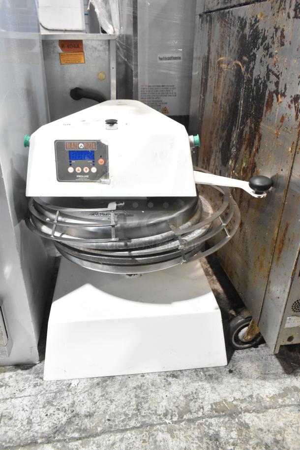 2021 Proluxe DP2350 dough press, 208V, 1 phase. Used condition, Blaze Pizza logo on control panel, suitable for commercial use.