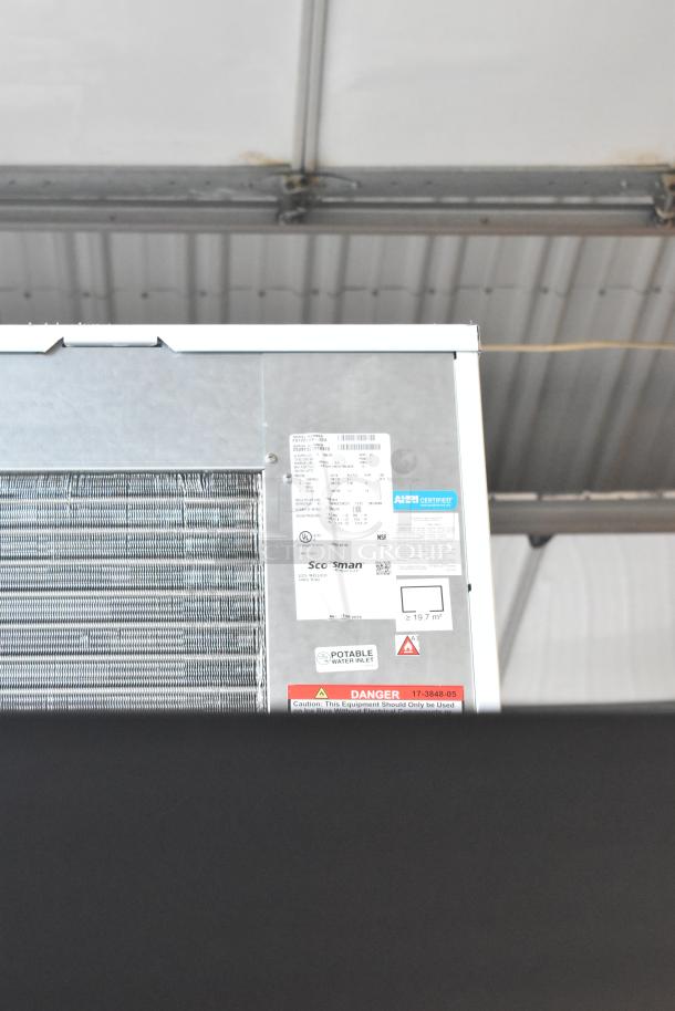 Scotsman FS1222AX-32A Prodigy® Plus 22" Flake Ice Machine, scratch and dent, 208/230V, with tags and warnings visible.