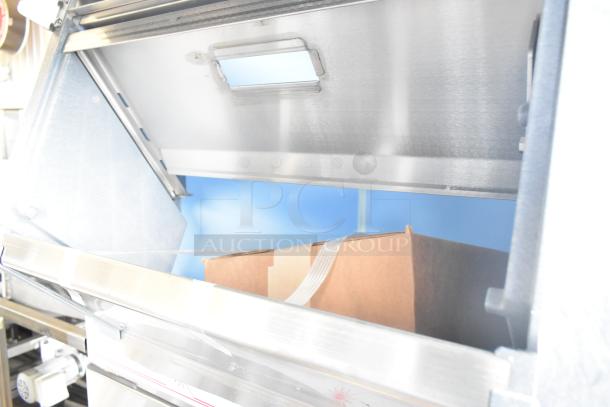 Brand new Scotsman FS1222AX-32A Prodigy Plus flake ice machine in stainless steel interior, with Scotsman LQ1BASE stand.