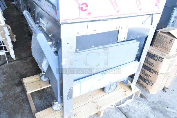 BRAND NEW 2025 Scotsman FS1222AX-32A Flake Ice Machine on LQ1BASE stand with gray poly ice cart. Minor scratches visible.