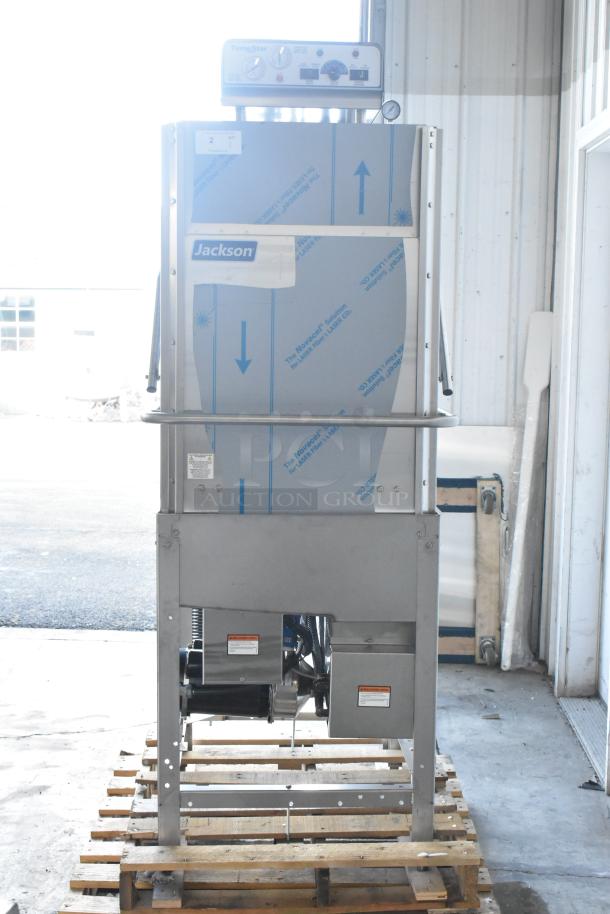 BRAND NEW 2023 Jackson TempStar HH-E commercial dishwasher, high hood, with electric booster heater, on a pallet.