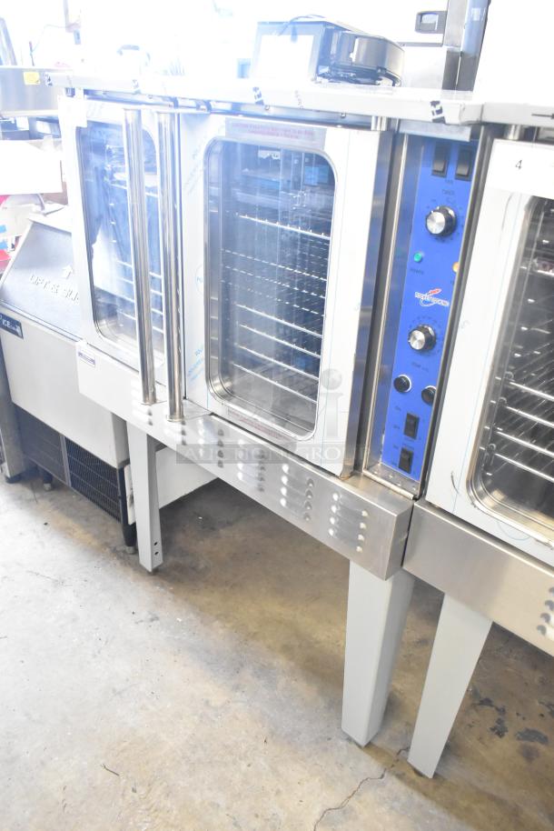 Brand new Rocket Cooking ENCVE-3-208 convection oven, full size, electric, view-through doors, 208 volts, 3 phase, minor dents.
