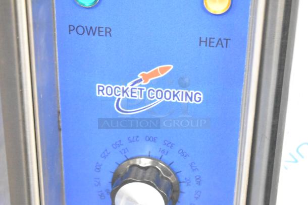 Brand new Rocket Cooking ENCVE-3-208 convection oven panel showing brand logo, power, and heat indicators.