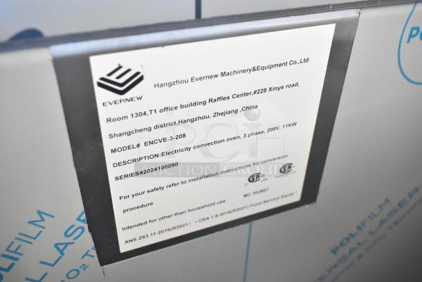 Alt text: "Label on 2024 Rocket Cooking ENCVE-3-208 Convection Oven, 208V, 3-phase. Displays model and safety info."