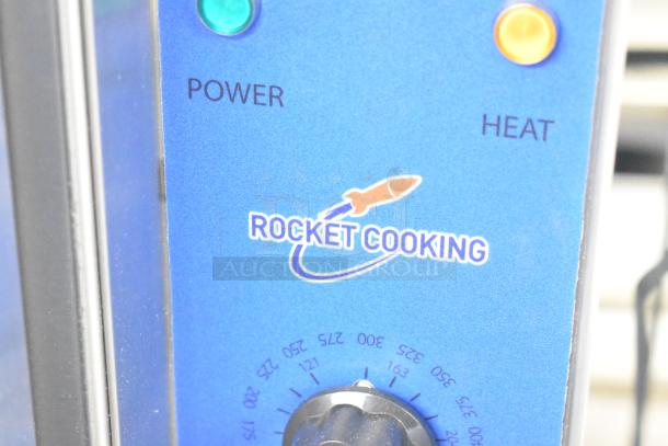 "Rocket Cooking ENCVE-3-208 commercial convection oven, new scratch and dent, view-through doors, thermostatic controls, 208V, 3-phase."