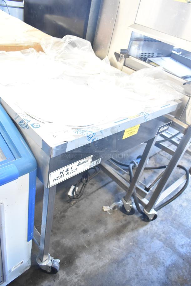 Brand new Belshaw H&I-4 glazing station, scratch and dent, on casters, 208-240V, 1 phase, with visible labels.