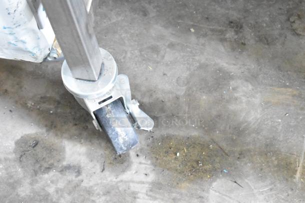 New Belshaw H&I-4 Heat and Ice Glazing Station caster wheel, durable commercial design, scratch and dent condition. 208-240V, 1-phase.