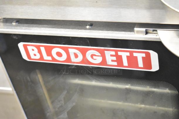 Blodgett HV-100G HydroVection commercial convection oven with view-through doors and thermostatic controls on casters.