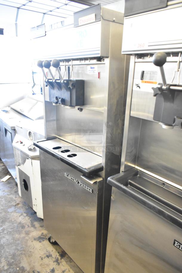 Electro Freeze 30T-RMT-137 soft serve ice cream machine, stainless steel, dual flavor with twist, on casters, good condition.