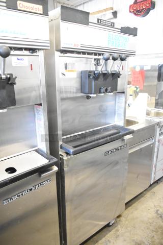 Electro Freeze 30T-RMT-137 commercial ice cream machine; 2 flavor with twist; water-cooled; on casters; clean condition.