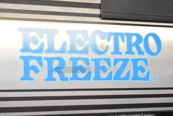 Electro Freeze 30T-RMT-137 soft serve machine logo, stainless steel panel, commercial use, water cooled, on casters.