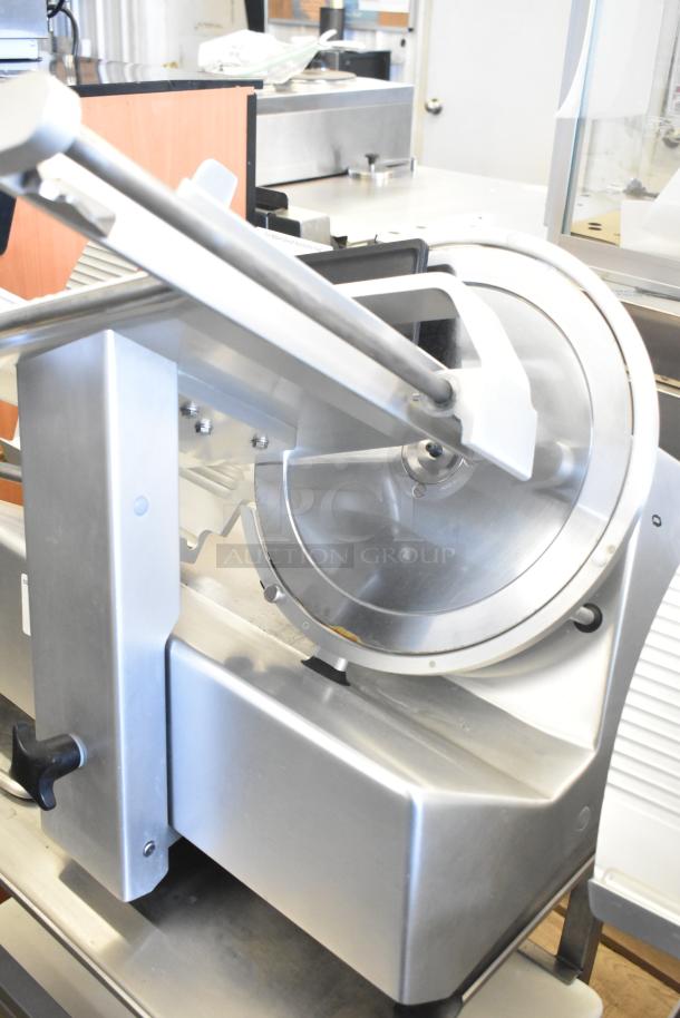 2017 Bizerba GSP HD meat slicer, commercial countertop model, 120V, 1 phase, on equipment stand. Excellent condition.