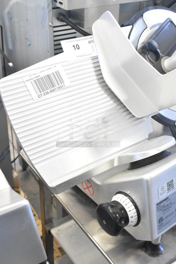 Bizerba GSP H commercial meat slicer on stand, 120V, 1 phase, detailed dials and label with model info visible.