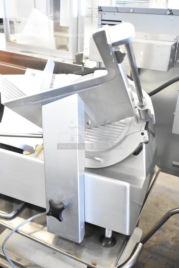 Bizerba GSP H commercial countertop meat slicer on a slicer equipment stand, 120 volts, 1 phase, excellent condition.