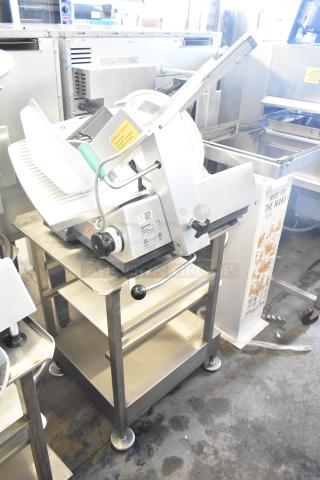 2018 Bizerba GSP HD meat slicer on equipment stand, 120V, 1 Phase. Stainless steel finish, adjustment controls visible.