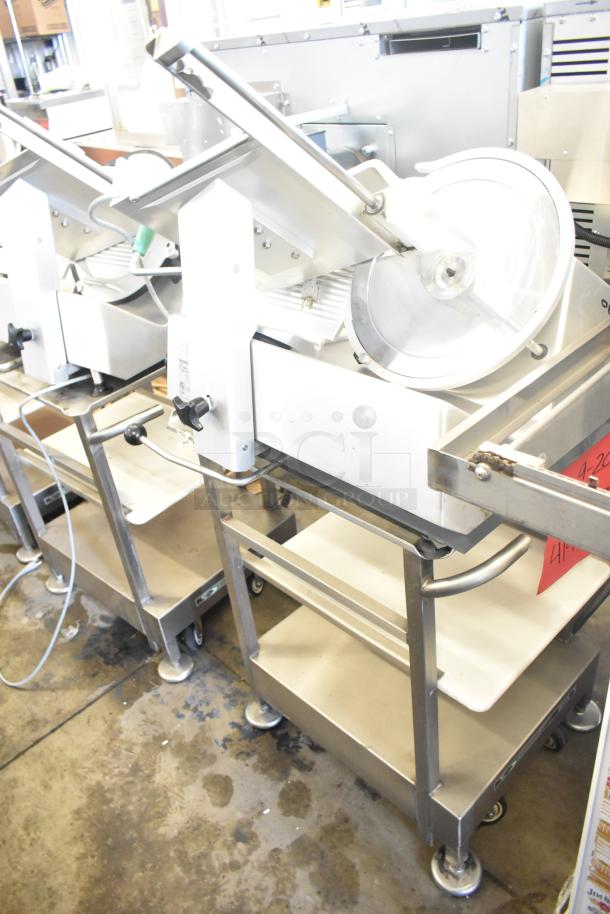 2018 Bizerba GSP HD meat slicer on equipment stand, 120V, 1 phase. Stainless steel, good condition, commercial use.