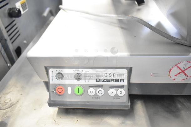 2018 Bizerba GSP HD meat slicer on equipment stand, shows control panel with on/off buttons. 120V, 1-phase, good condition.