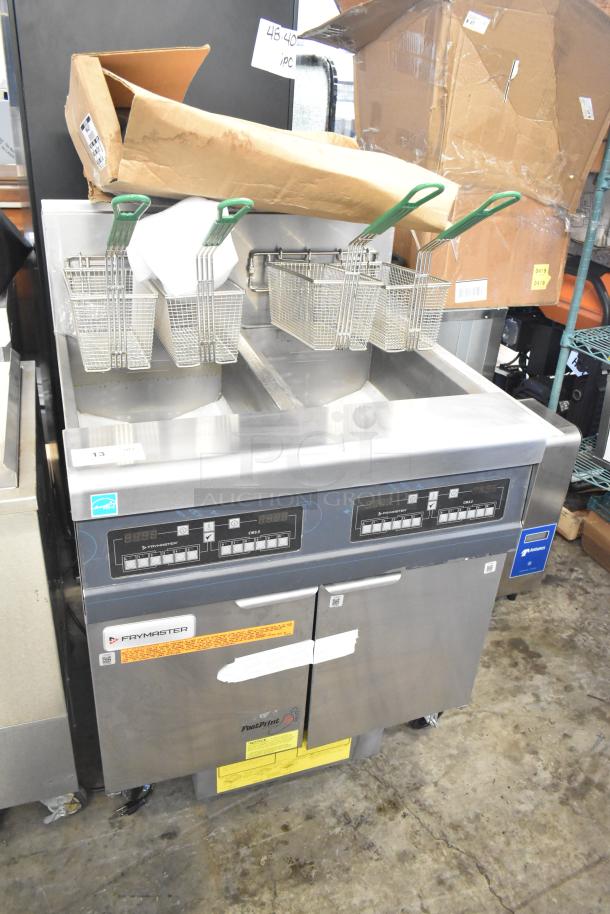 Brand new Frymaster FPPH255CSE propane deep fat fryer with filtration system, 4 baskets, on casters, 80,000 BTU.