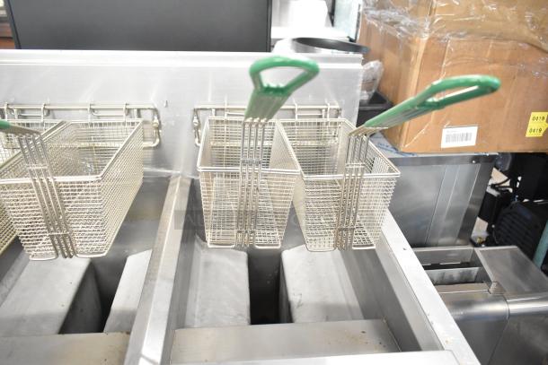 Brand new 2021 Frymaster FPPH255CSE commercial propane fryer with 4 metal baskets and filtration system; 80,000 BTU.