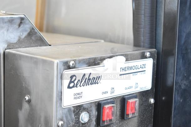 Belshaw Adamatic TG-50 stainless steel thermoglazing station, 208V, 1 phase, with commercial casters, front panel view.