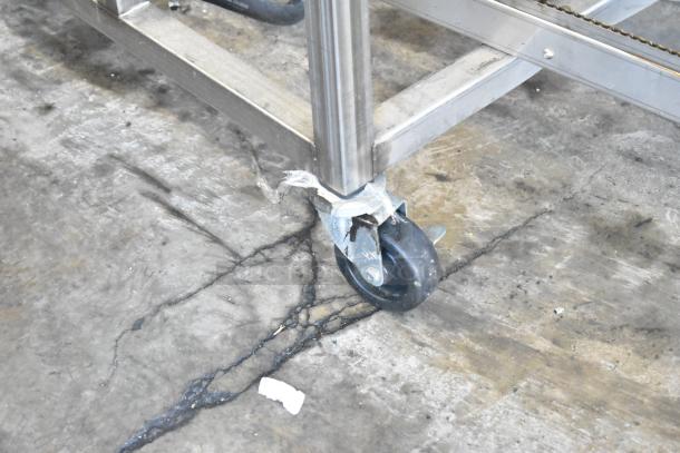 Belshaw Adamatic TG-50 thermoglazing station, stainless steel, commercial casters, 208V, 1 phase, in good condition.