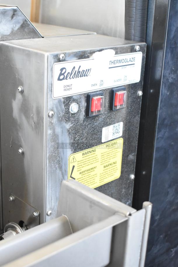 Belshaw Adamatic TG-50 Thermoglazing Station, stainless steel, on casters. Features labeled controls and warning labels. 208V, 1 Phase.