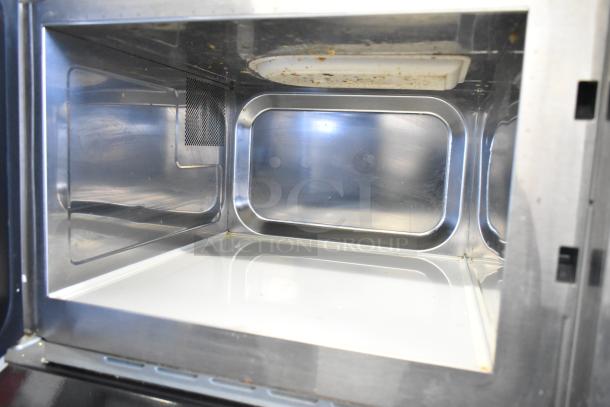 2021 Amana RCS10TS commercial microwave, interior view, stainless steel, 120V, used condition.