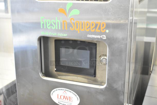 LATE MODEL JBT 2ND-GEN-MFJ-HE citrus juicer on casters, "Fresh'n Squeeze" branding, touchscreen, 120V, 1 Phase.