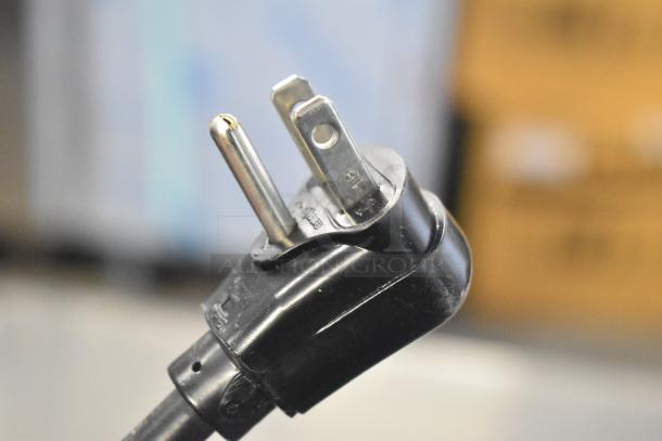 Close-up of a power plug for the Amana RCS10TS commercial microwave oven, 120 volts, 1 phase.