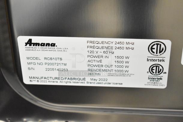 2022 Amana RCS10TS commercial microwave oven label; 120V, 1 phase, 1500W power input, 1000W output, manufactured May 2022.